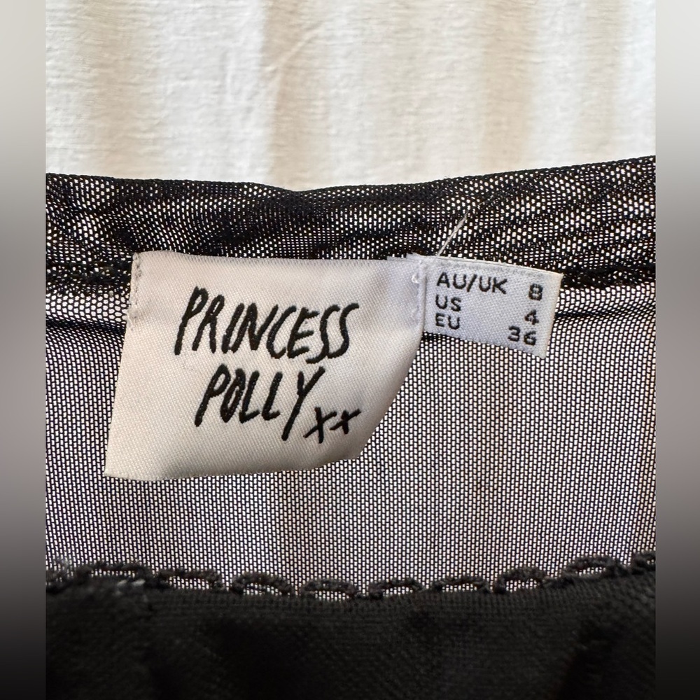 Princess Polly corset top with sheer back and sleeves. Size 4/small.